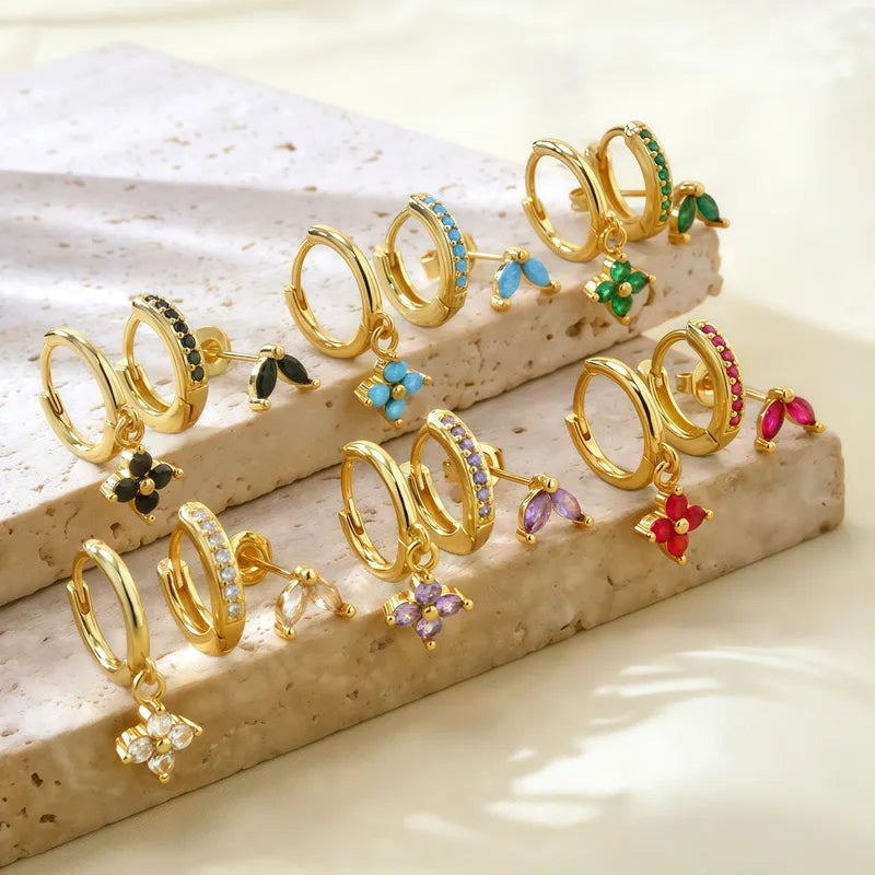 Pendiente trébol de cuatro hojas oro rojo